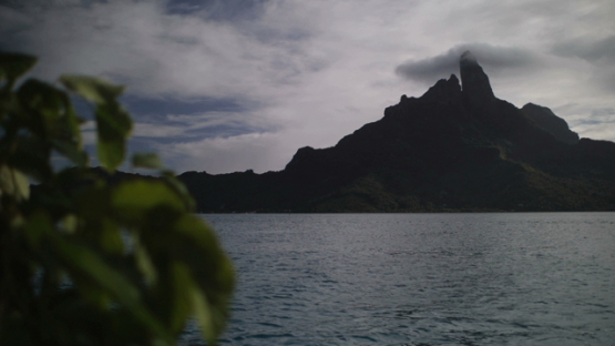 Bora Bora, sailing in the lagoon, view on the mountain, slow motion