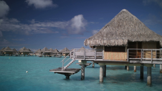 Bora Bora, view on a luxury hotel and bungalow, slow motion