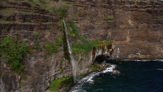 Hiva Oa, Aerial view of waterfall along the coast, Marquesas island