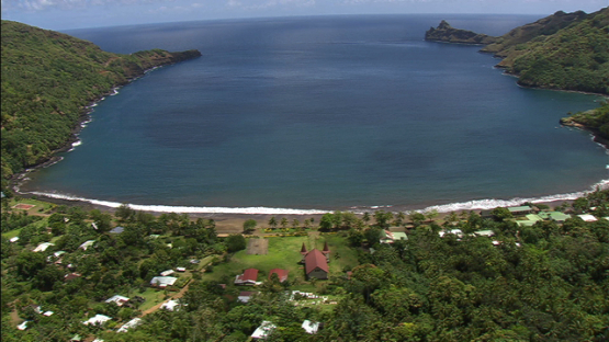 Aerial view of Nuku Hiva, over the village and the bay of Hatiheu