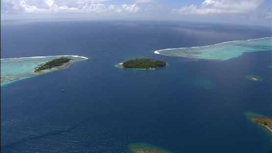 Raiatea, leeward islands, aerial view of the pass and ilets of Uturoa