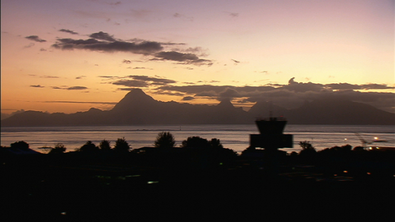 Aerial view of Moorea, shot from Tahiti airport during sunset, windward islands