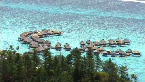 Moorea aerial view, luxury hotel and overwater bungalows in the lagoon, windward islands