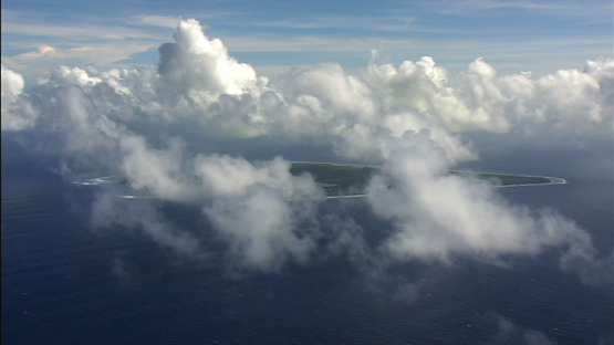 Maiao aerial view hidden behind the clouds, windward islands