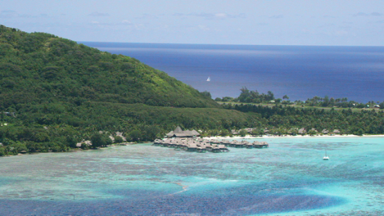 Moorea, aerial view of an hotel in the lagoon, windward islands, 4K UHD