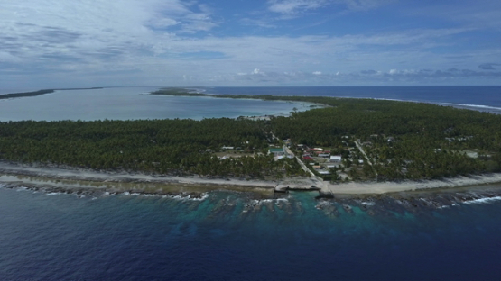 Reao, aerial drone video of the atoll and village, Tuamotu, Polynesia 4K UHD