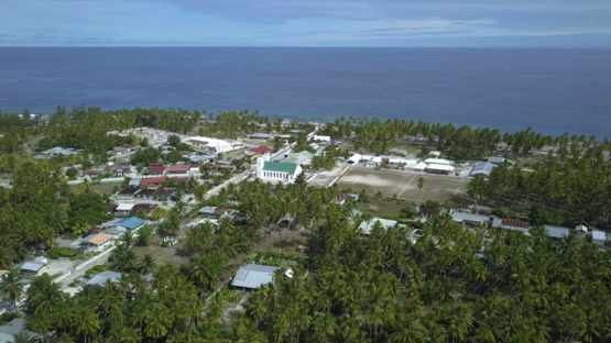 Reao, aerial drone shot  of the village, Tuamotu, Polynesia 4K UHD