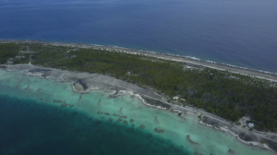 Reao, aerial drone video of the lagoon and reef, Tuamotu, french Polynesia, 4K UHD
