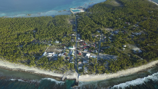 Reao, aerial drone video of the village, Tuamotu, Polynesia, 4K UHD