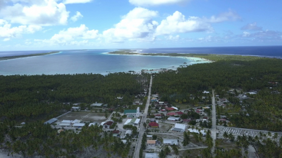 Reao, aerial view by drone of the village, tuamotu, polynesia, 4K UHD