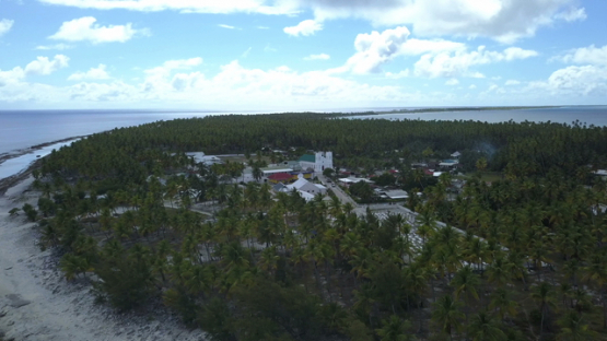 Reao, aerial drone video of the village, Tuamotu in french Polynesia,  4K UHD