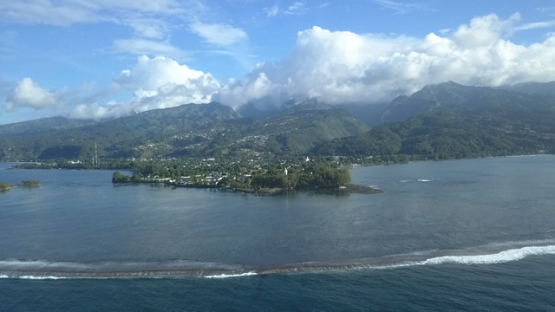 Aerial video by drone of the lighthouse of Pointe Venus and reef, Tahiti, Polynesia