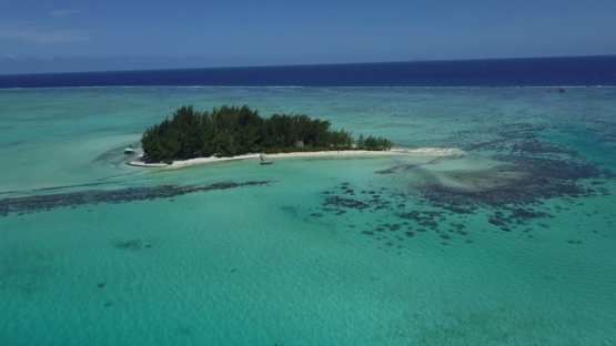 Bora Bora, aerial drone video of motu tapu in the turquoise lagoon, leeward island, polynesia 4K UHD