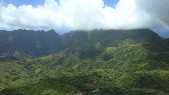 Fatu Hiva, aerial drone video of mountains and clouds, Marquesas islands, Polynesia, 4K UHD