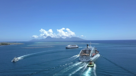 Papeete, aerial drone video of a cruise ship leaving the bay, Tahiti, Polynesia 4K UHD