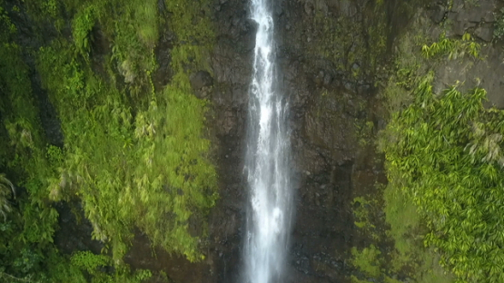 Tahiti, Aerial drone shot of waterfall, up to down