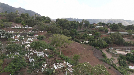 Hiva Oa, aerial drone view of the cimetery of Atuona, Marquesas islands, Polynesia, 2K7