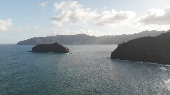 Hiva Oa, aerial drone view of Hanake rock in the bay of Atuona, Marquesas islands, Polynesia, 2K7