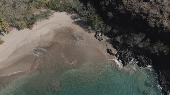 Tahuata, aerial drone view of withe sand beach in the bay, marquesas islands, Polynesia, 2K7