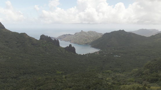 Aerial drone video, Nuku Hiva, bay of Hatiheu, rocky mountains, marquesas islands, 2K7