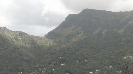 Aerial drone video, Nuku Hiva, valley and bay of Hatiheu, rocky mountains, marquesas islands, 2K7