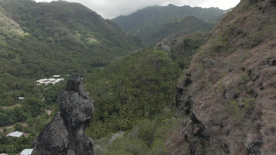 Fatu Hiva, aerial drone view of villlage Omoa and mountains surrounding, marquesas islands, 2K7
