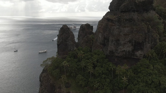 Aerial drone view of Fatu Hiva, between the rocks of Hanavave, Marquesas islands, Polynesia, 2K7