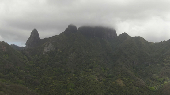 Aerial drone view of Ua Pou, peaks and mountains in clouds, Marquesas islands, Polynesia, 2K7