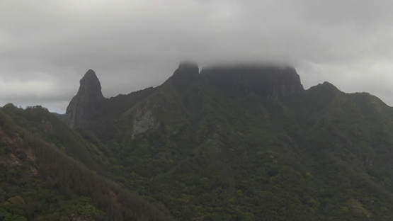 Aerial drone view of Ua Pou, peaks and mountains in clouds, Marquesas islands, Polynesia, 2K7