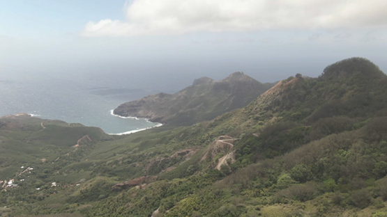 Aerial drone view of Ua Pou, bay and mountains, Marquesas islands, Polynesia, 2K7
