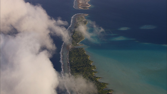 Aerial view of the atoll and barrier reef, Tuamotu, French Polynesia