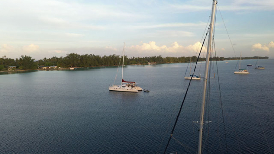 Fakarava, Sail boats anchored in the lagoon, 4K UHD aerial view
