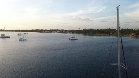 Fakarava aerial view, Sail boats anchored in the lagoon, 4K UHD