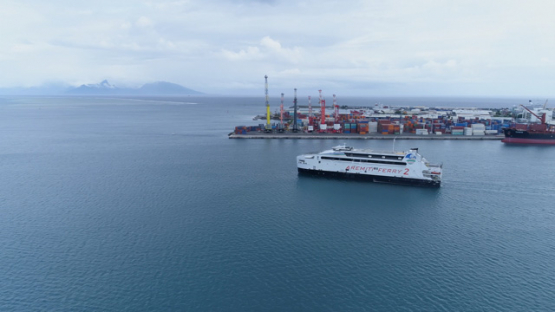 Tahiti, aerial view of a ferry boat in Papeete harbour, 4K UHD