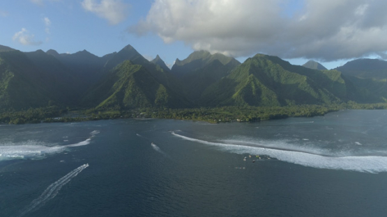 Tahiti; aerial view of the pass Teahupoo and mountains, 4K UHD