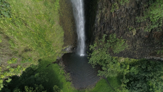 Tahiti, aerial view of waterfall in the Valley of Papenoo, 4K UHD