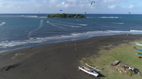 Tahiti, Mahina, aerial view of Motu Martin and kite surfers, 4K UHD