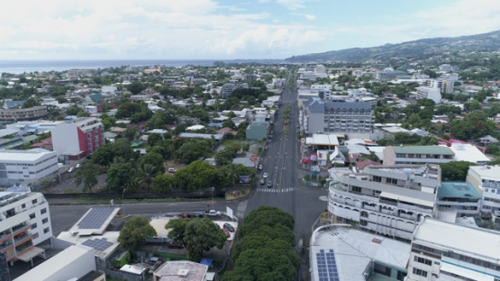 Tahiti, aerial drone shot of the town Papeete and Prince Hinoi avenue, 4K UHD