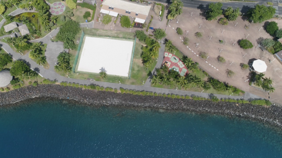 Tahiti, aerial drone shot above Paofai Park  and Toata of Papeete, 4K UHD