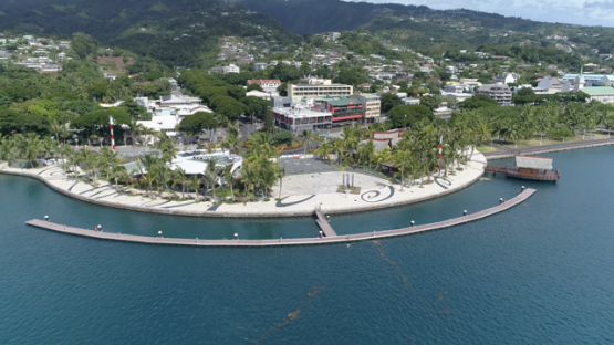 Tahiti, aerial drone shot of the seafront and sqare of Papeete, 4K UHD