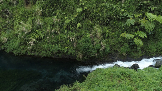 Tahiti, aerial view of waterfall near the lake Vaihiria, 4K UHD