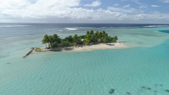 Huahine, aerial view of the motu Topati in the bay Maroe, 4K UHD