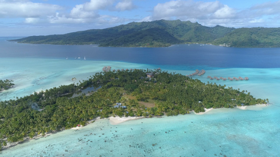 Tahaa, aerial view of the island and hotel in the lagoon, 4K UHD