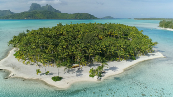Bora Bora, aerial view of the island and islet in the lagoon, 4K UHD