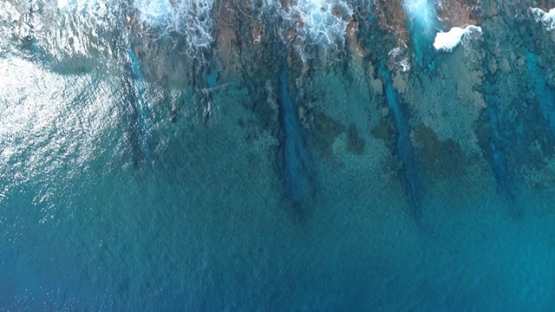 Bora Bora, aerial view above the barrier reef, 4K UHD