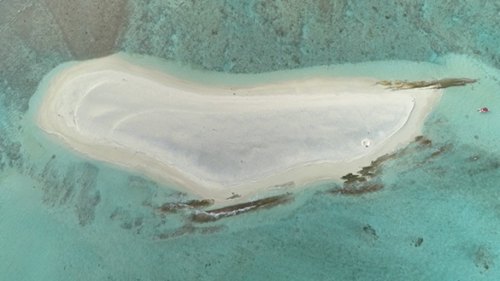 Tubuai, aerial view above the islet Motu Ono, 4K UHD