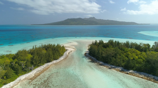 Tubuai, aerial view between the islet Motu Roa and Motu Toena, 4K UHD