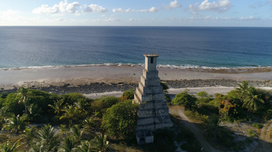 Fakarava, aerial view of the old light tower near the reef, 4K UHD