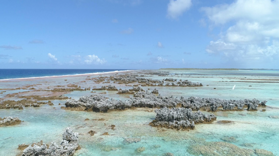 Rangiroa, aerial view of reef island and barrier reef, 4K UHD