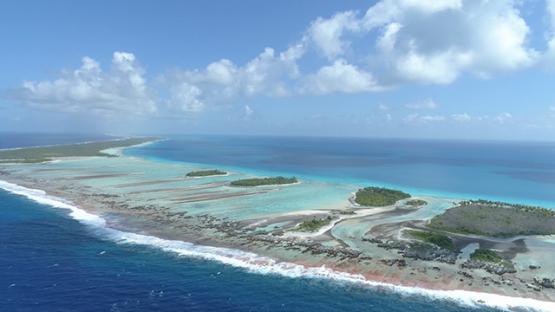 Rangiroa, aerial view of reef island and barrier reef, 4K UHD